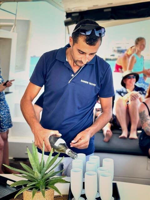 Hersonissos: Sunset Catamaran Cruise with Snacks and Drinks - The Sunset Experience