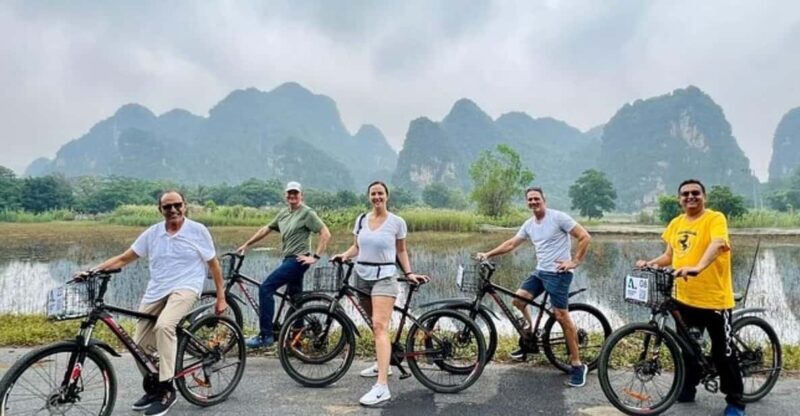 HOA LU - TAM COC - MUA CAVE -1 DAY TRIP BY LIMOUSINE - Scenic Bamboo Boat Ride in Tam Coc