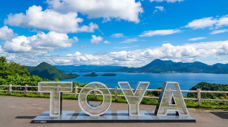 Hokkaido: Lake Toya Snowmobile & Noboribetsu Hell Valley & Bear Ranch & Lake Hill Farm Day Tour - Fukidashi Park or a snowy Lake Toya viewpoint