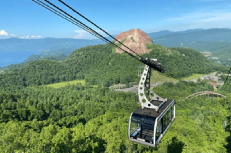 Hokkaido Regular Sightseeing Bus: D Lake Shikotsu & Lake Toya Round Trip Course (Audio Guide Course) - Lake Toya, lunch and a welcome pause