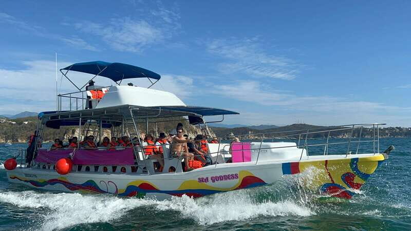Huatulco: Bays Boat Tour with Snorkeling and Hotel Pickup - Key Points
