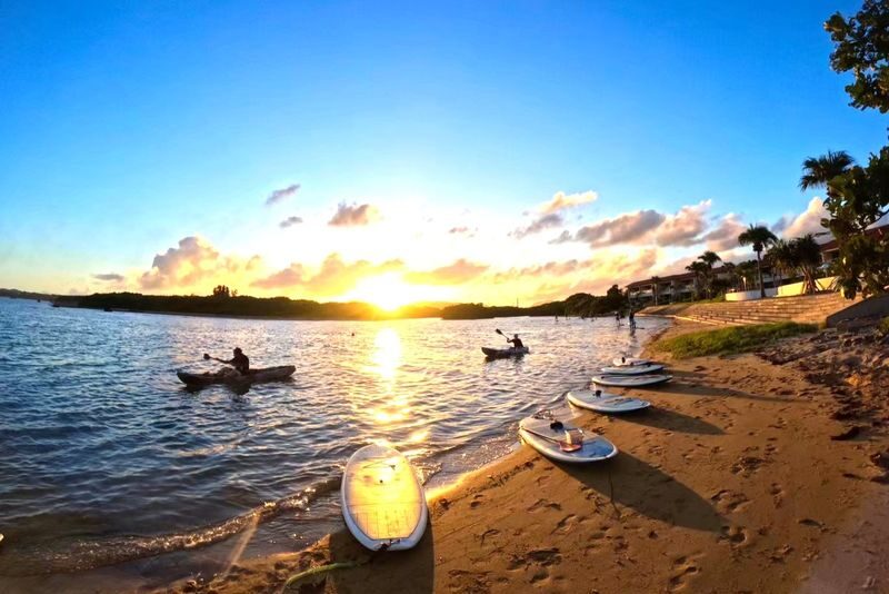 Ishigaki Island: Sunset SUP & Canoe Tour with Customizable Sunset Experience - On the water at Miyara River