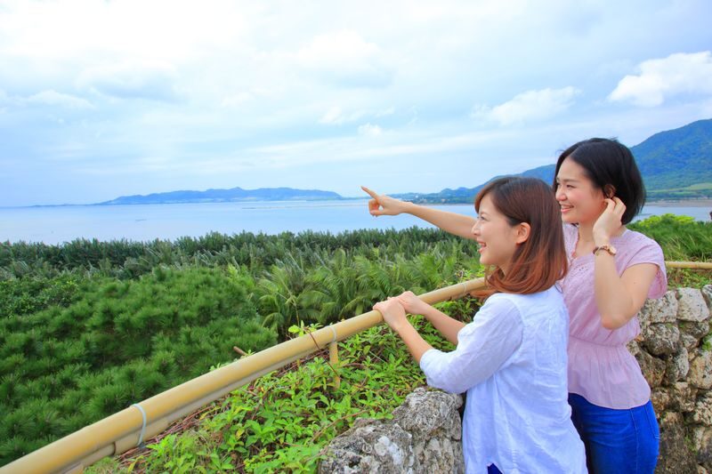 Ishigaki Yaima Village Admission Ticket - Traditional Yaeyama homes with a view over Nagura Bay