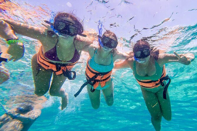 Isla Mujeres Catamaran, Open Bar and Beach Club Tour - Key Points