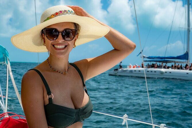 Isla Mujeres Catamaran Party Cruise with Snorkeling and Lunch - The Sum Up