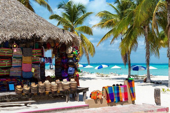 Isla Mujeres Catamaran Tour with Snorkel, Open bar and Transport - Frequently Asked Questions