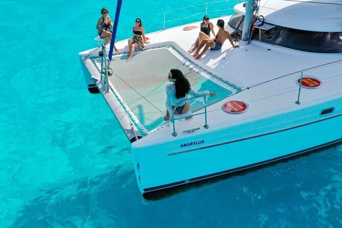Isla Mujeres: Catamaran Tour with Snorkeling Food, Drinks, Beach - Practical Aspects and What to Expect