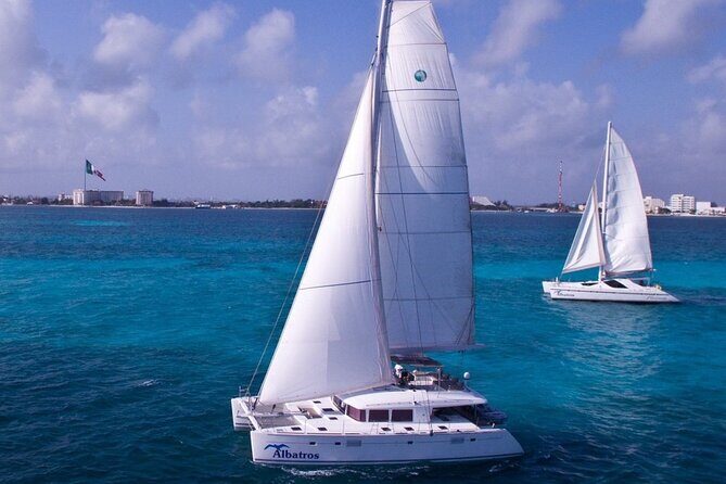 Isla Mujeres Catamaran Tour with Snorkeling Spinnaker and Lunch - The Sum Up
