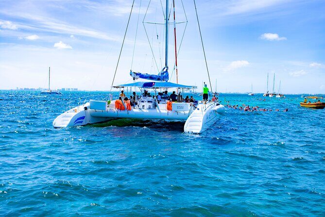 Isla Mujeres Tour on Catamaran with Snorkel, Open Bar, Buffet & Beach club - Who Should Consider This Tour?