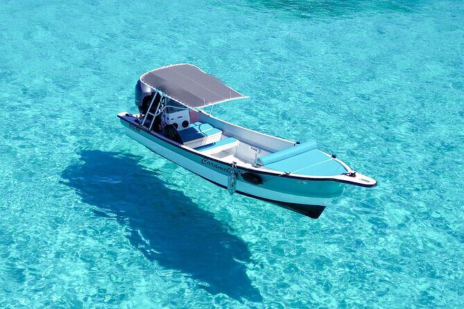 Johnny Kay and Aquarium Private Boat by the Sea of 7 Colors - Key Points