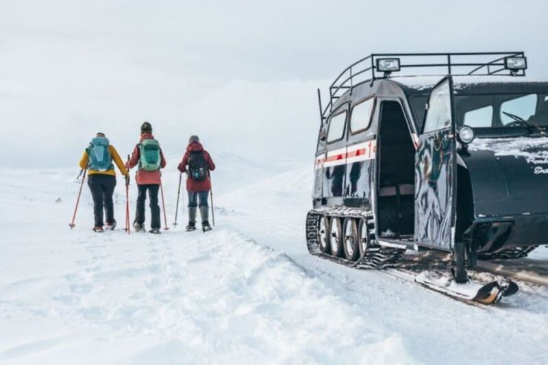Jotunheimen: Snowcoach Tour with Snowhoeing and Lunch - Experience Norway’s Winter Charm on a Snowcoach Tour in Jotunheimen