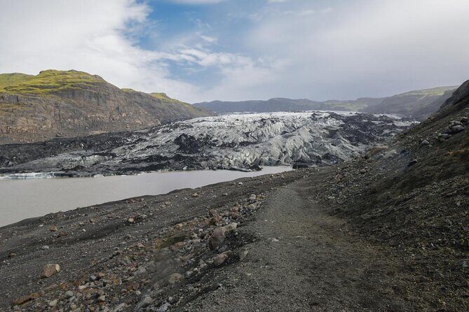 Katla Ice Cave and South Coast Waterfalls Tour From Reykjavik - The Journey Begins: Reykjavik Pickup and Scenic Drive