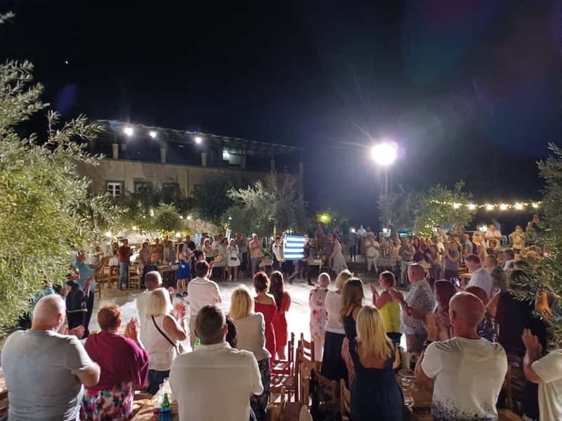 Kos: Greek Dinner with Music, Dancing, and Unlimited Wine - Key Points