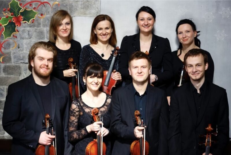 Krakow: Christmas Music Concert With Wine - The Atmosphere: Cozy, Intimate, and Festive