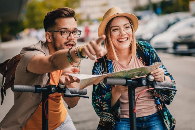 Krakow: Guided Sightseeing Tour by E-Scooter with Snacks - Detailed Breakdown of the Tour