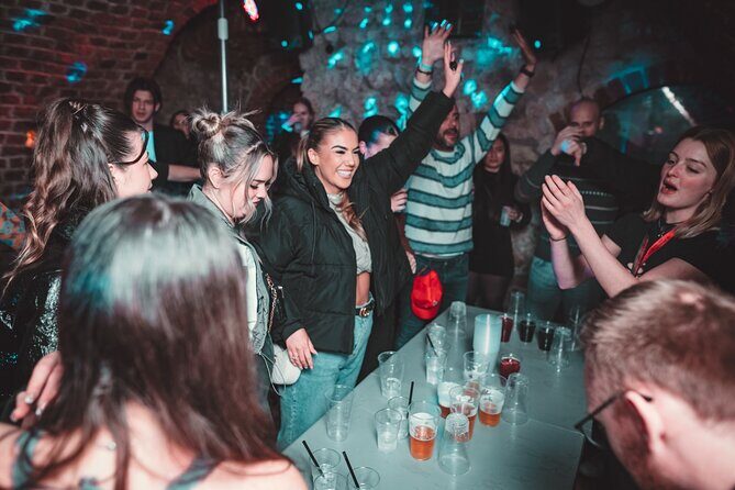 Krakow Pub Crawl with 1 Hr of unlimited alcohol & 4 clubs/pubs - A Fun-Filled Night in Krakow: The Pub Crawl Experience