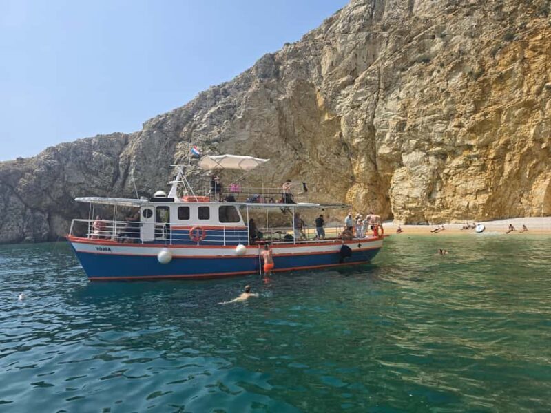 Krk: Golden Beach and Blue Cave Cruise with Welcome Drink - The Sum Up