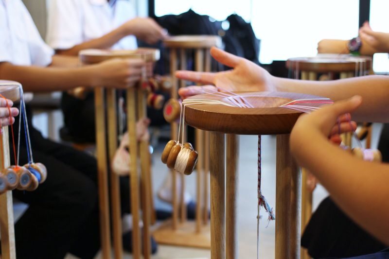 Kumihimo Workshop at a Historic 370-Year-Old Braiding Shop in Tokyo - The workshop: a steady rhythm with silk