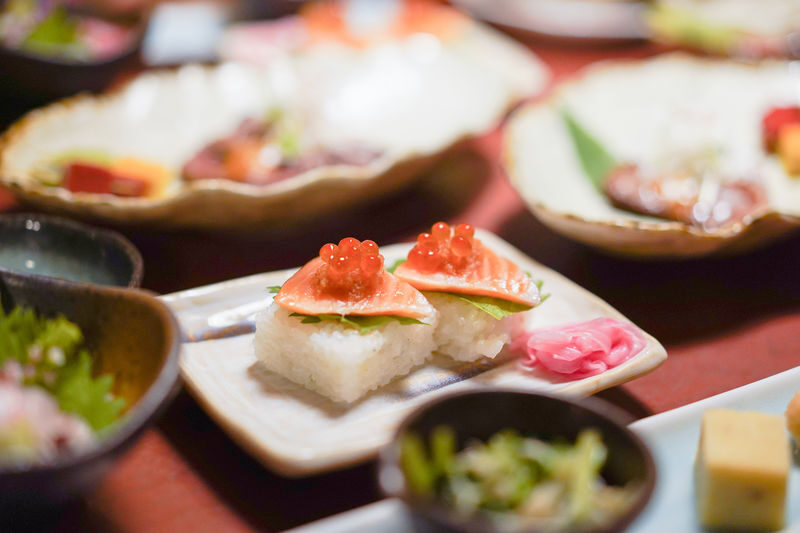Kyoto Premium Night Foodie Tour in Gion(9+dishes + 3 Sake tastings) - Stop three: sake, a standing bar and a sweet finish