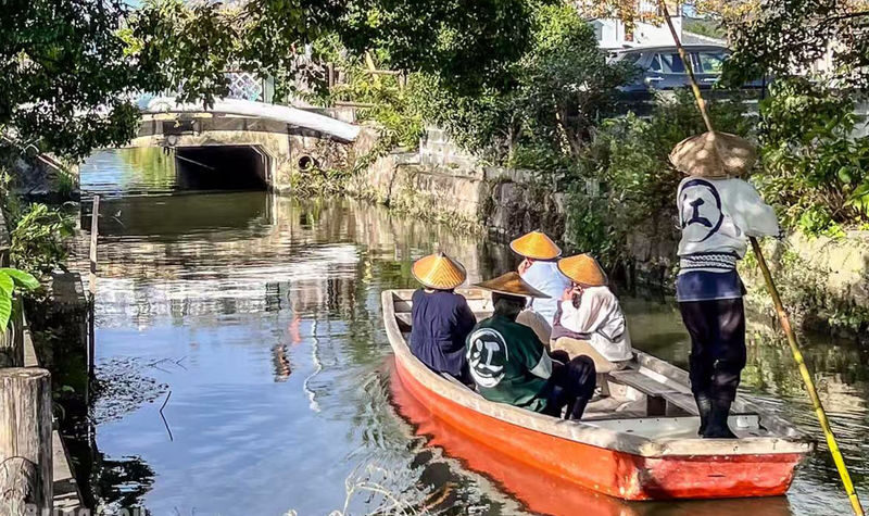 Kyushu Itoshima Coast Sightseeing & Shiraito Falls & Yanagawa River Cruise & Dazaifu Tenmangu Shrine Classic Dual Route Day Tour - Couple Rocks and a swing above the shore