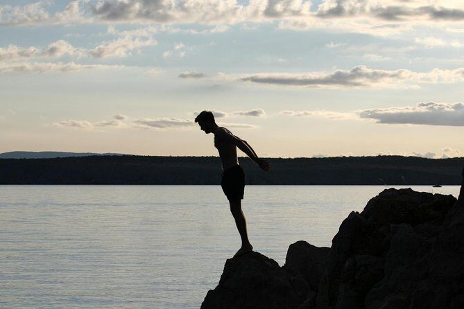 Lagoon Adventure: Jungle, Turtle Release & Cliff Diving Spectacle - Key Points