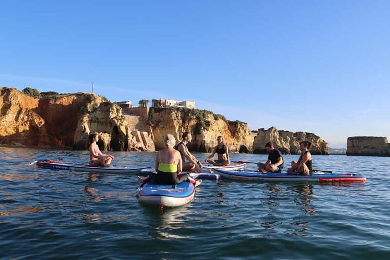 Lagos: Sunrise SUP Yoga Experience at Praia dos Estudantes - Key Points