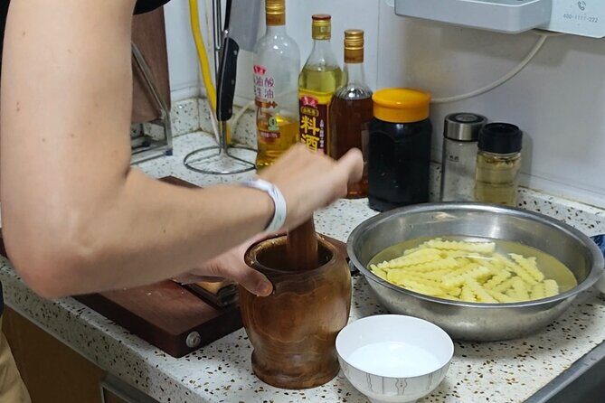 Learn cold noodle and wolf-teeth potato at local home - Exploring the Cooking Class: A Deep Dive