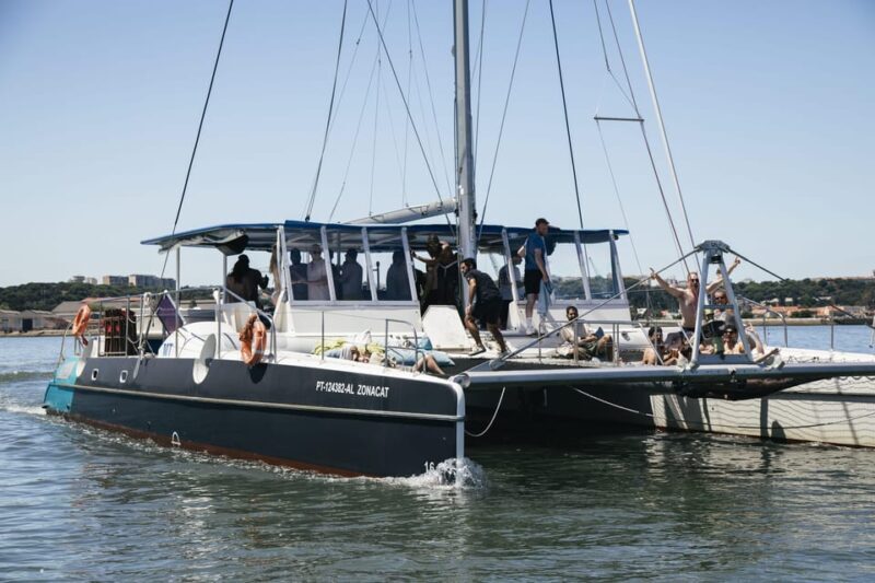 Lisbon: Catamaran Boat Party with Music, Open Bar & Dives - What’s Included and What to Expect