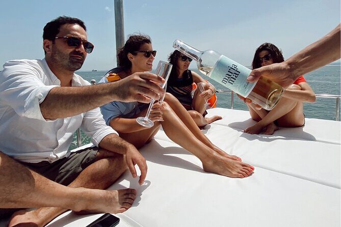 Lisbon: Catamaran Luxury Sunset and Wine Tour - Setting the Scene: A Perfect Way to Experience Lisbon