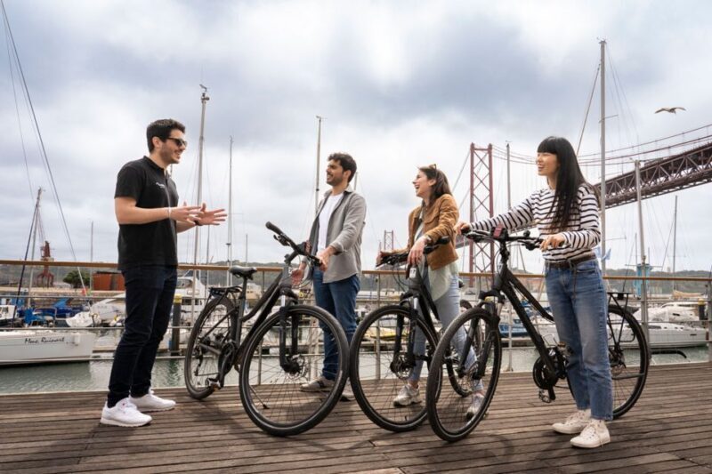 Lisbon: Guided Bike Tour, Helicopter Flight, and Boat Trip - The Sum Up