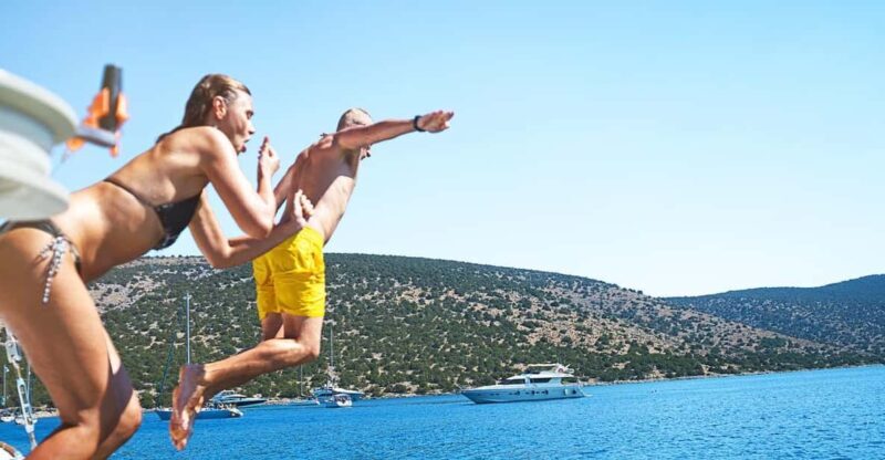 Lisbon: Sightseeing Cruise with Open Bar, DJ & Swim Stop - Who Should Consider This?