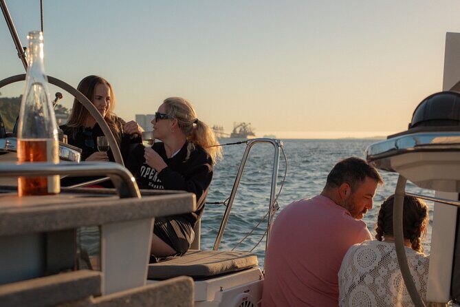 Lisbon Sunset Boat Cruise Tour With Drinks Included - Key Points