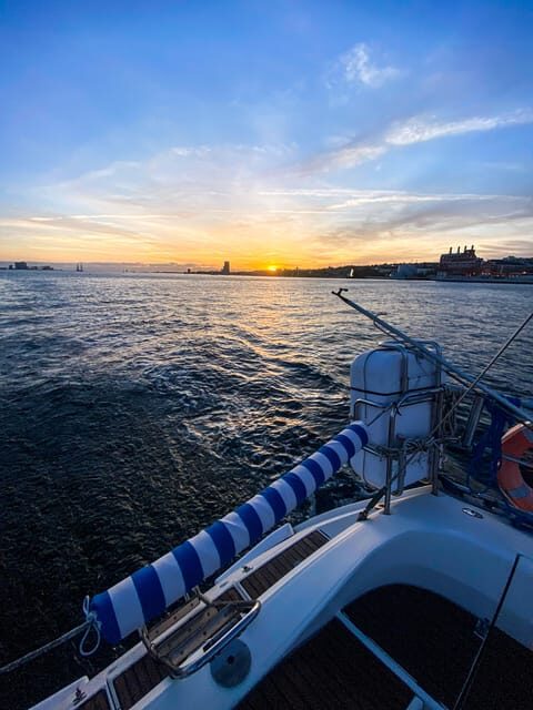 Lisbon: Sunset boat tour with green wine - Key Points