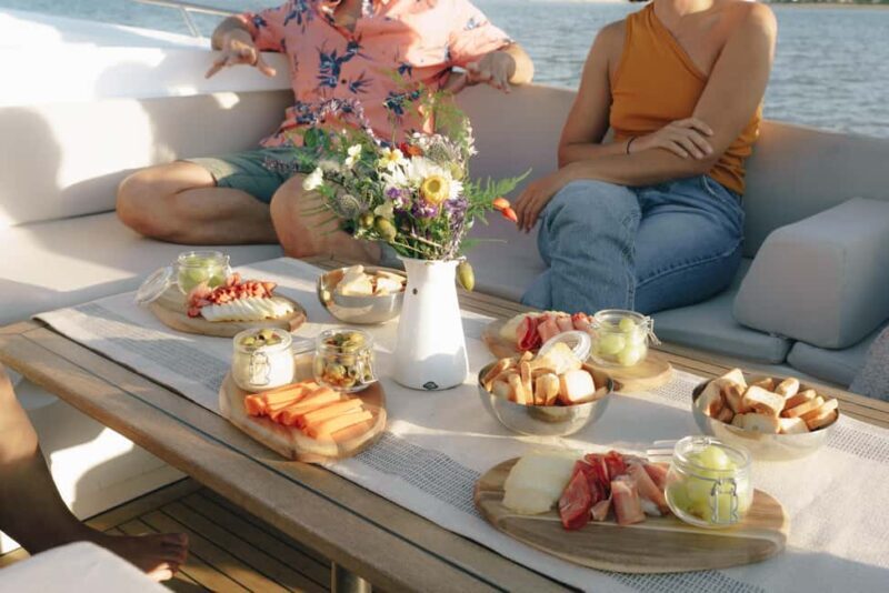 Lisbon Sunset Boat Tour with local Snacks & Drinks - Practical Details and Tips