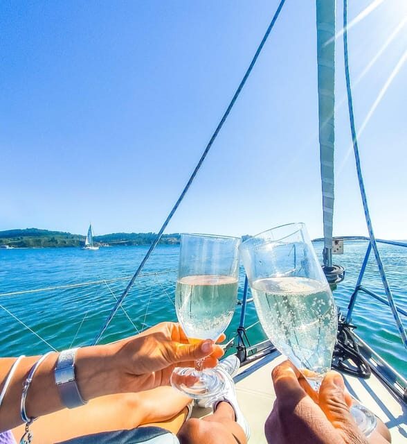 Lisbon: "Sunset" & "Day Tours" by boat, with drink and music - A Deep Dive into Lisbon’s Boat Tour Experience