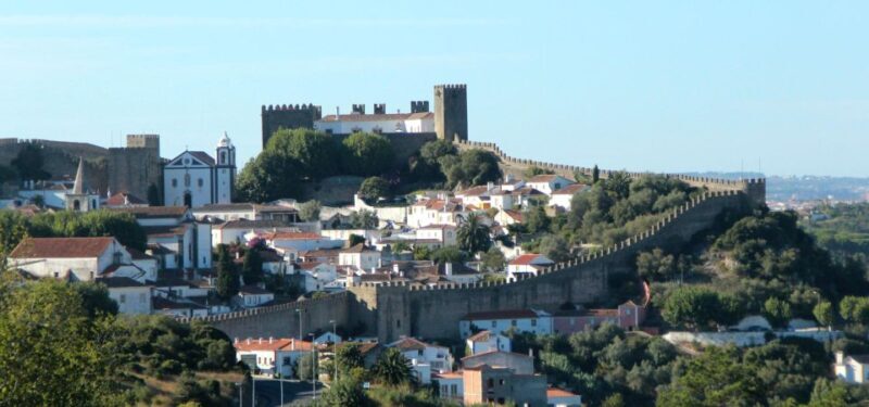Lisbon to Porto stop Óbidos, Nazaré, Fátima, Coimbra, Aveiro - An Unforgettable Day Traveling from Lisbon to Porto