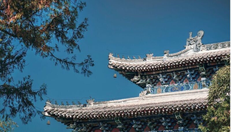 Luoyang: Longmen Grottoes and White Horse Temple Guided Tour - Key Points