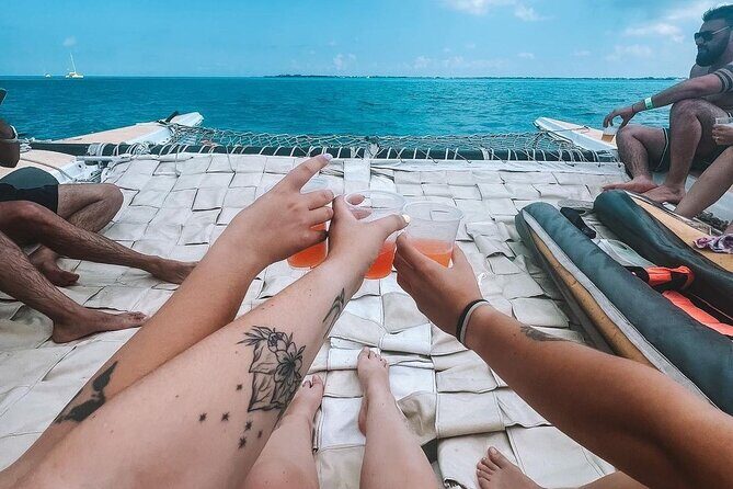 Luxury Catamaran to Isla Mujeres, Snorkeling, Buffet and Ice Bar - Sunset Sail and Final Toast