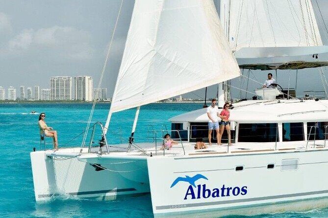 Luxury Catamaran Tour to Isla Mujeres with Transportation - Key Points