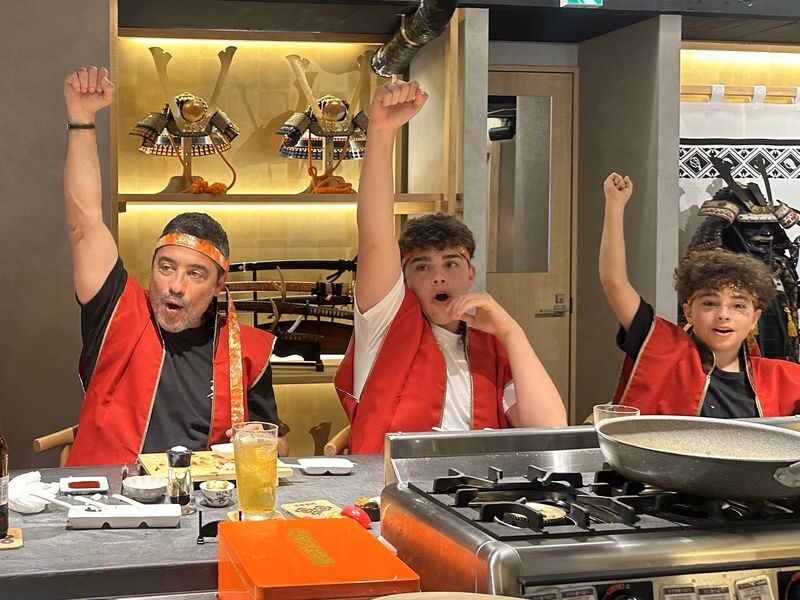 Luxury Samurai Sushi Dining Show in Asakusa Tokyo - A sushi counter with a samurai act