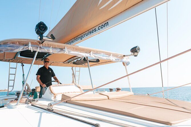 Luxury Santorini Sailing Cruise: Lunch, BBQ, Open Bar, Transfers - Exploring the Stops in Detail