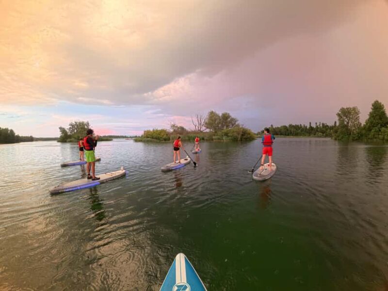 Lyon: Sunset Apéro on a lighted paddleboard at Miribel Jonage Park - Key Points