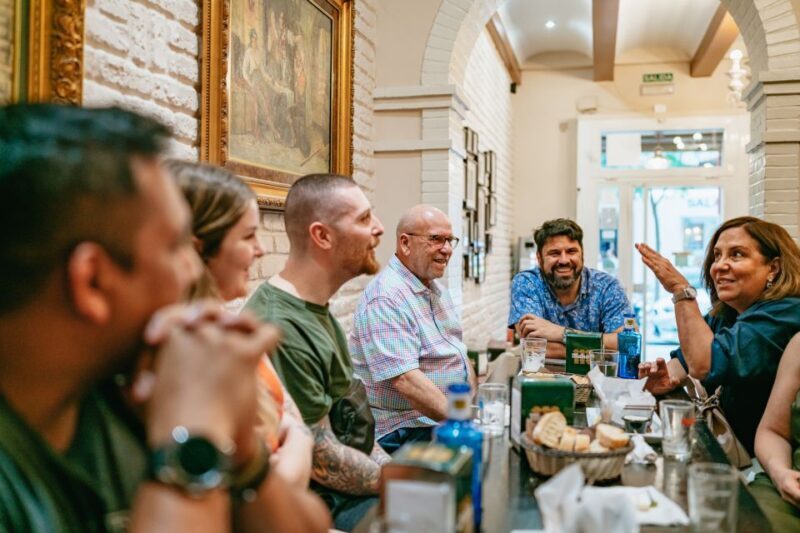 Madrid: Food & Wine Tour with 10 Tapas & 4 Drinks Included - Discover Madrid Like a Local with a Food & Wine Tour