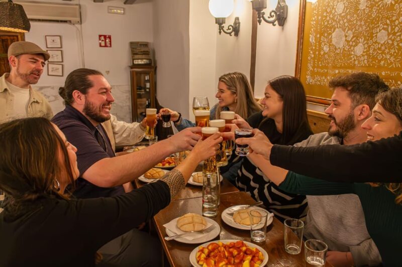 Madrid's Iconic Tapas, Taverns & History Experience - Key Points