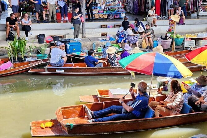 Maeklong Railway and Damnoen Saduak Floating Market Tour - Discover the Heart of Thailand: Maeklong Railway and Damnoen Saduak Floating Market Tour