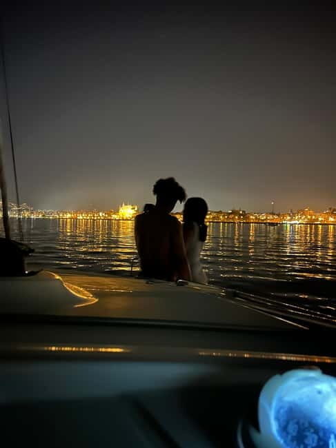 Majorca: Dinner aboard a private catamaran with snorkeling and paddle surfing - Authentic Flavors and Water Fun