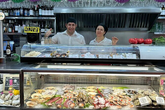 Malaga Food Walking Tour with Atarazanas Market Visit - The Tasting Stops: Flavors and Stories