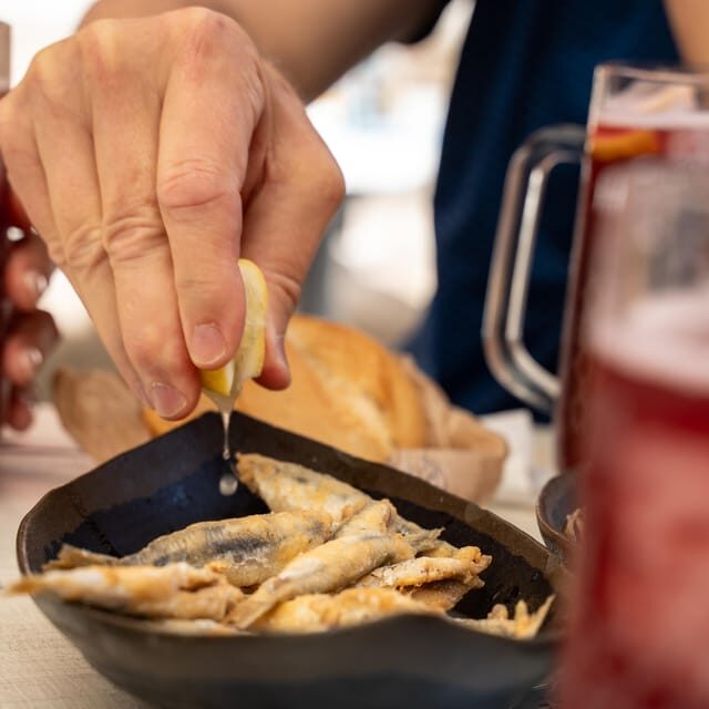 Malaga: Taste-of-Spain Walking Food Tour - Walking Through Malaga’s Streets and History