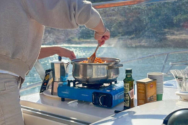 Mallorca: Private Watersports Boat. LUNCH Drinks SUP, Tubing - The Sum Up