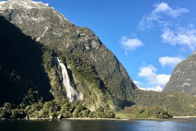 Milford Sound Tour from Queenstown with Scenic Cruise - First Stop: Lake Gunn – A Moment of Quiet Reflection